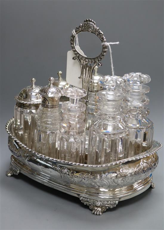 A Georgian composite silver eight-bottle cruet stand of shaped rectangular form,